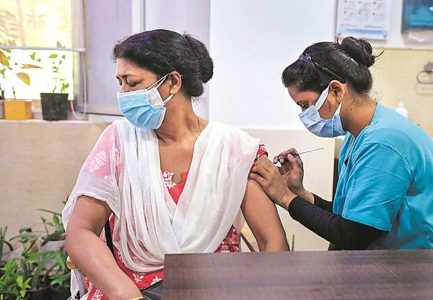 How did India waste over 100 million Covid vaccines
