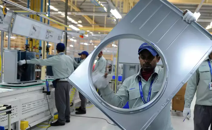 India is trying to unseat China in higher-end manufacturing, with iPhone maker Apple and chipmakers eyeing its vast lands and young population.